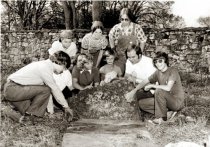 Cemetery Investigators with tombstone